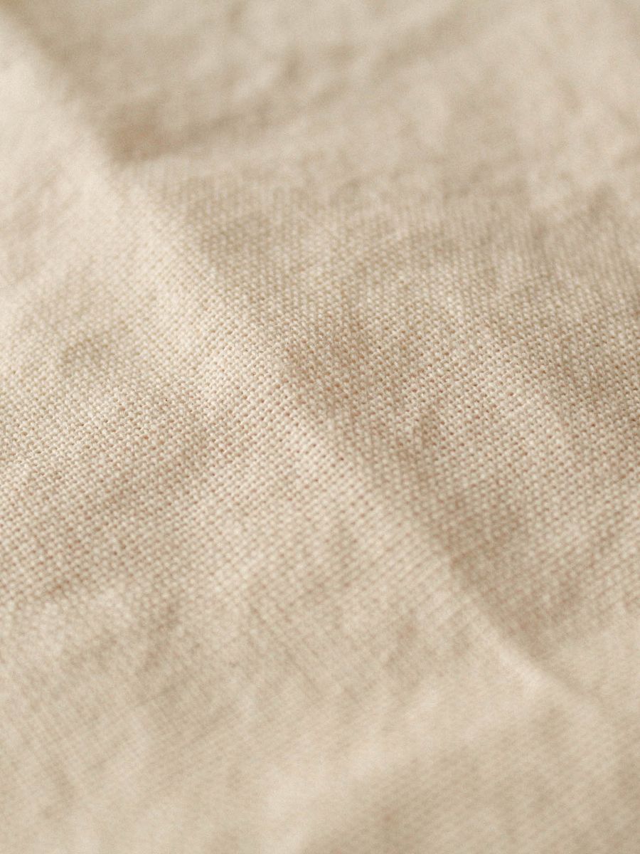 Close-up of fine plain weave cotton in natural ecru